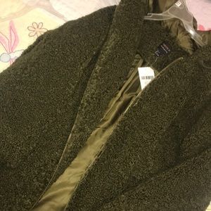 Green fuzzy coat